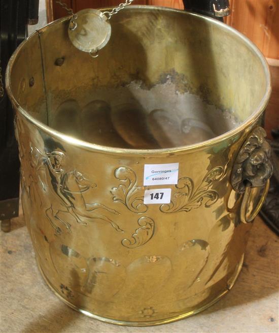 Embossed brass coal vase